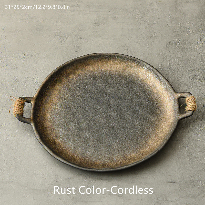 Hammered-glaze serving plate in gilt caramel and gold tones